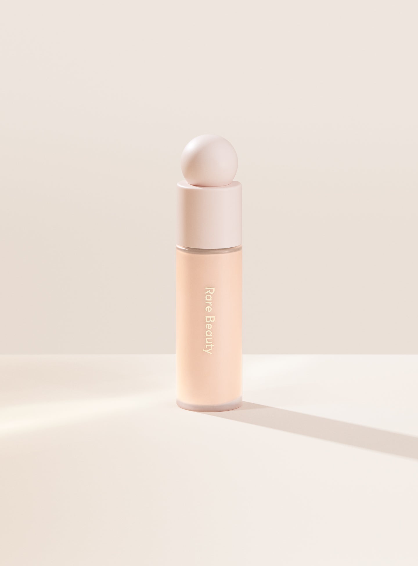 Rare Beauty's second foundation shade image, 110N, from the Liquid Touch Weightless Foundation range